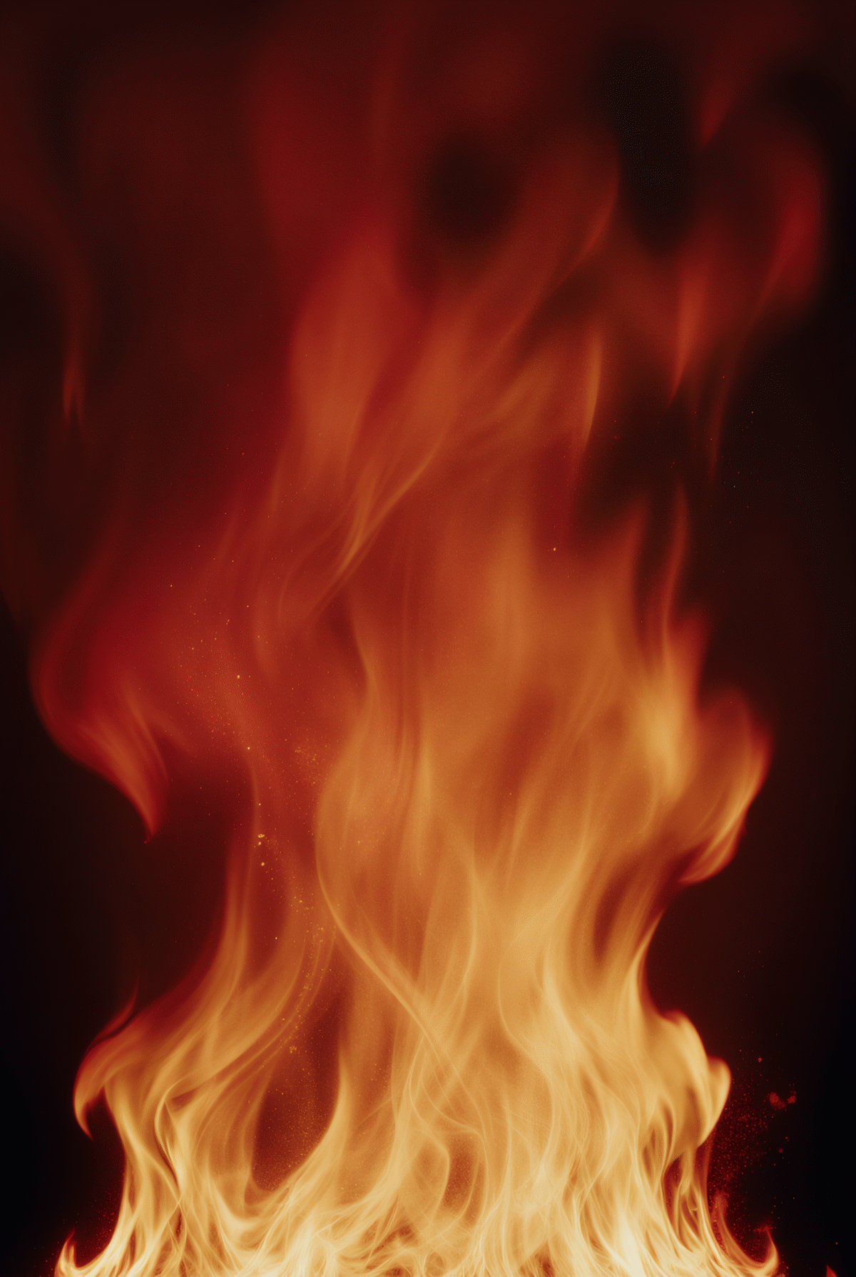 Close-up of red and orange fire flames in motion.