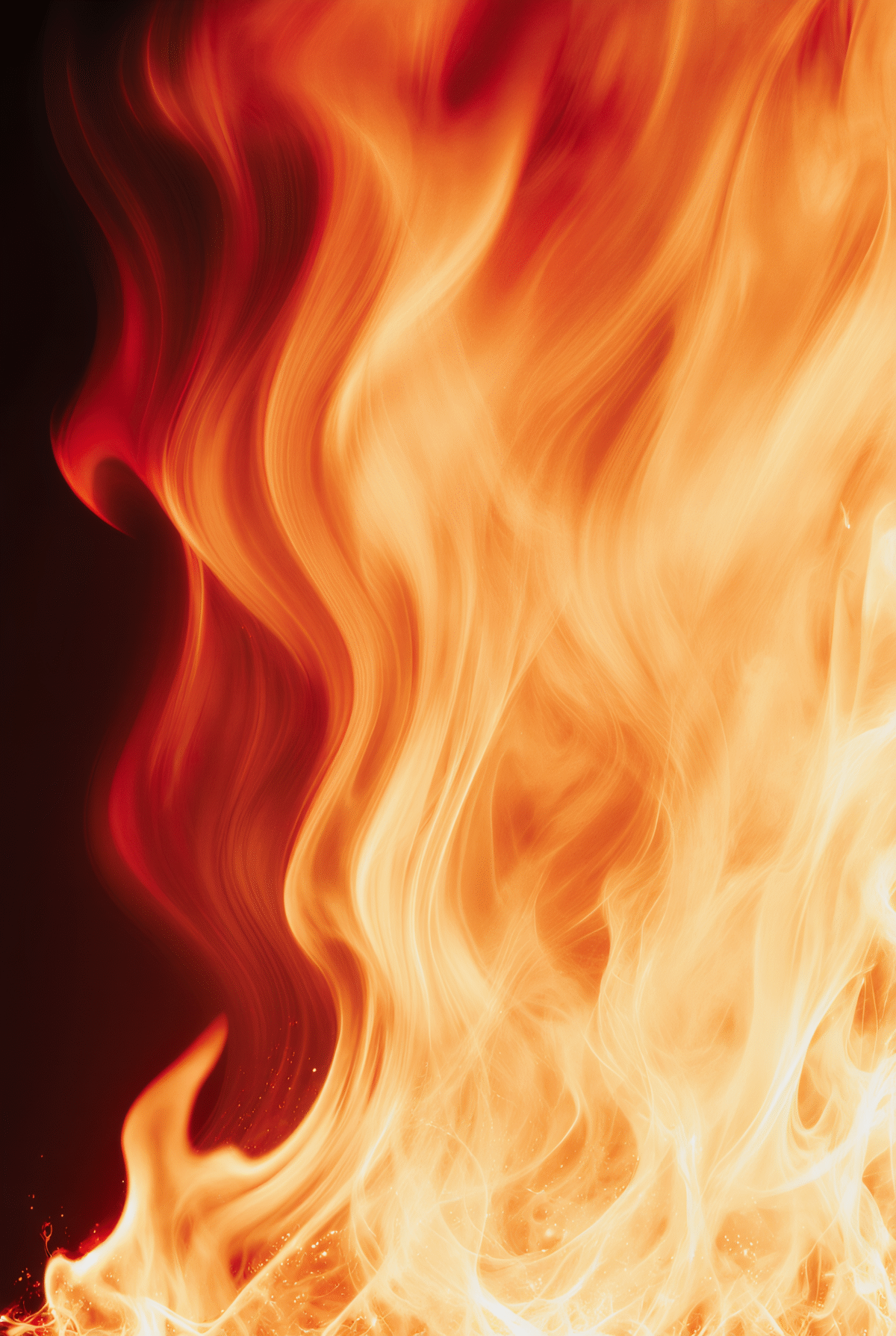 Abstract flame texture with glowing fire sparks.